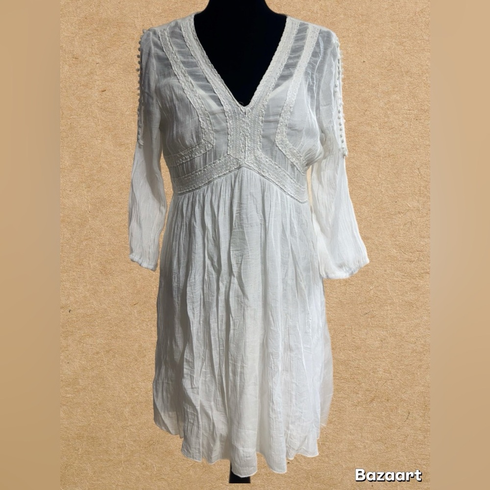J Glee white dress is perfect for any occasion.